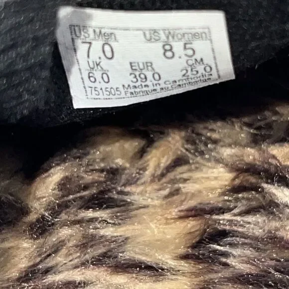 Vans Black and White Slip-On Sneakers - Picture 9 of 9